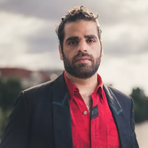 picture of ahmad, grey sky in the background 