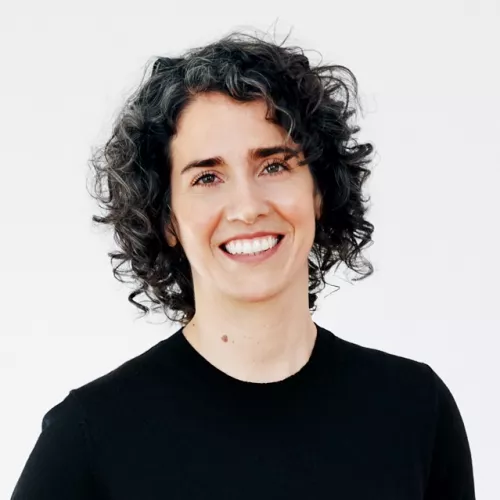 Headshot of Emily Poel, smiling.